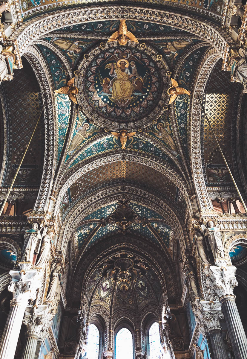 Ceiling in the Basilica of Notre Dame with beautiful golden details in Lyon France